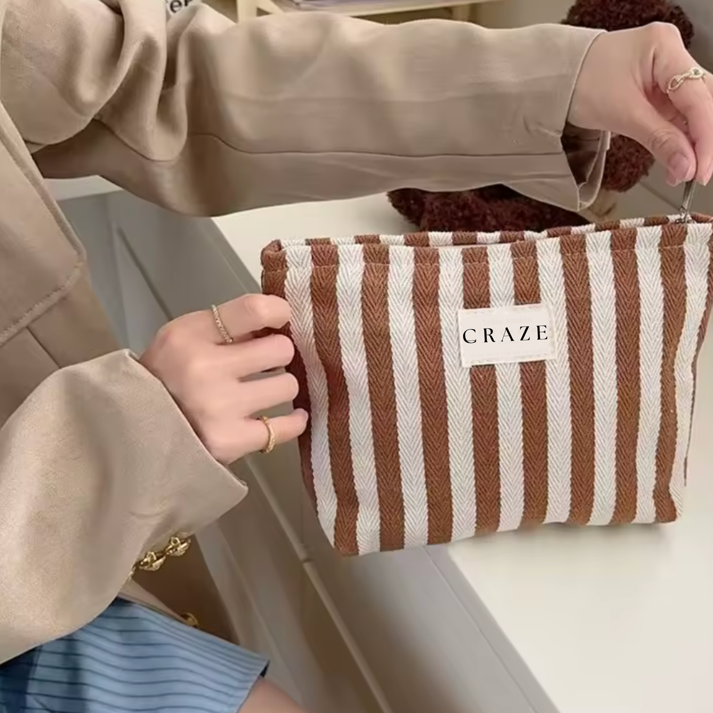 Neceser a rayas Marrón